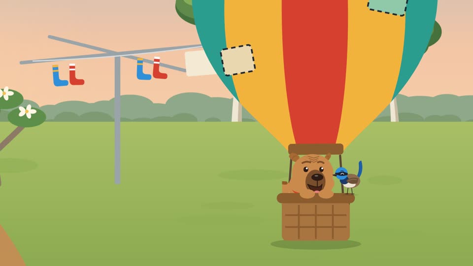 Victor and Echo in the balloon basket outside the house at dawn